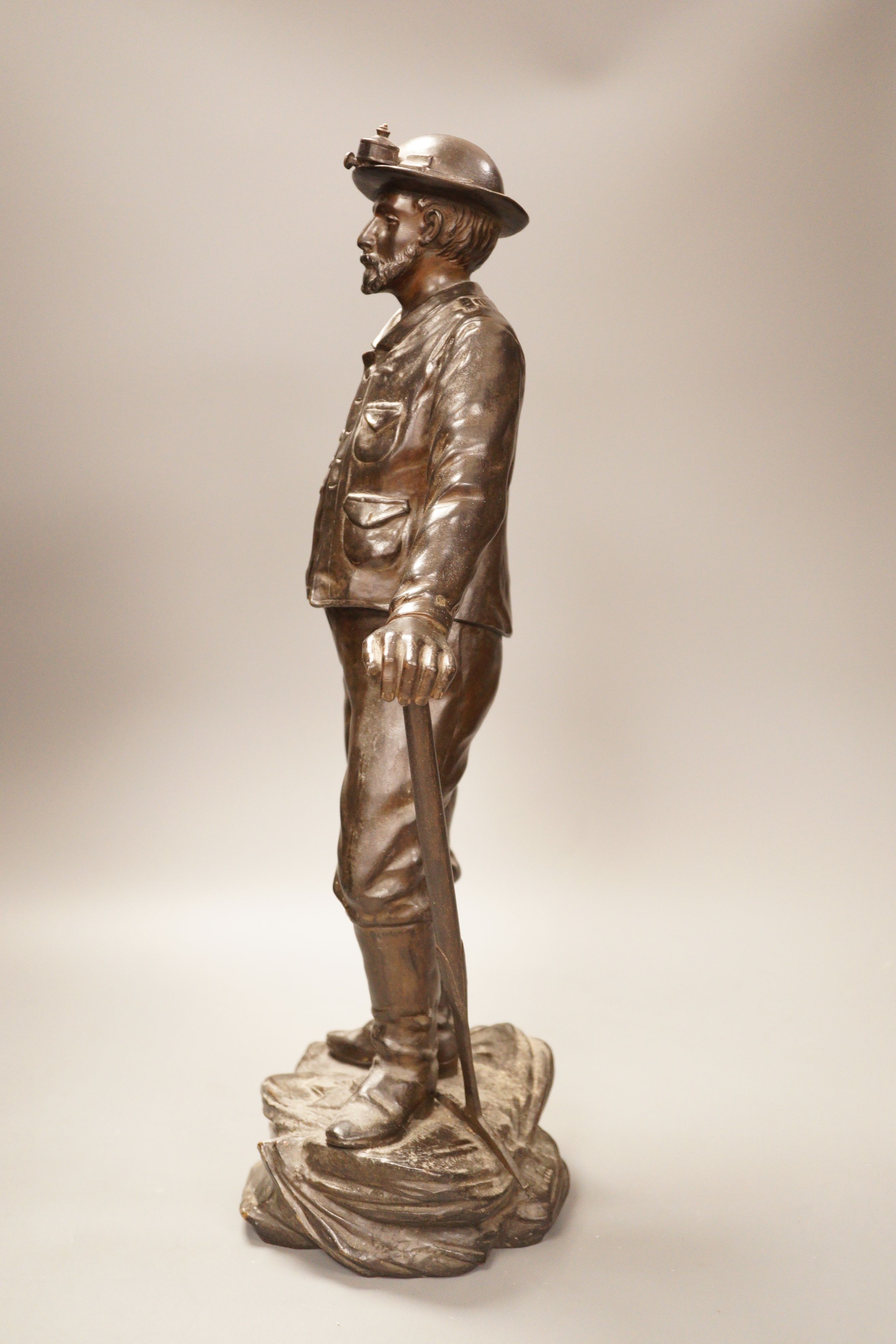 A French bronze figure, 'Dans la mine, par N. Telriv', 48cm